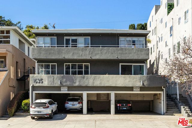 a car parked in front of a building