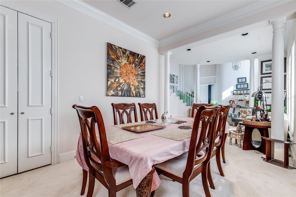5929 Pebblestone Lane Plano, TX 75093 - Photo 4 of 24 a view of a dining room with furniture