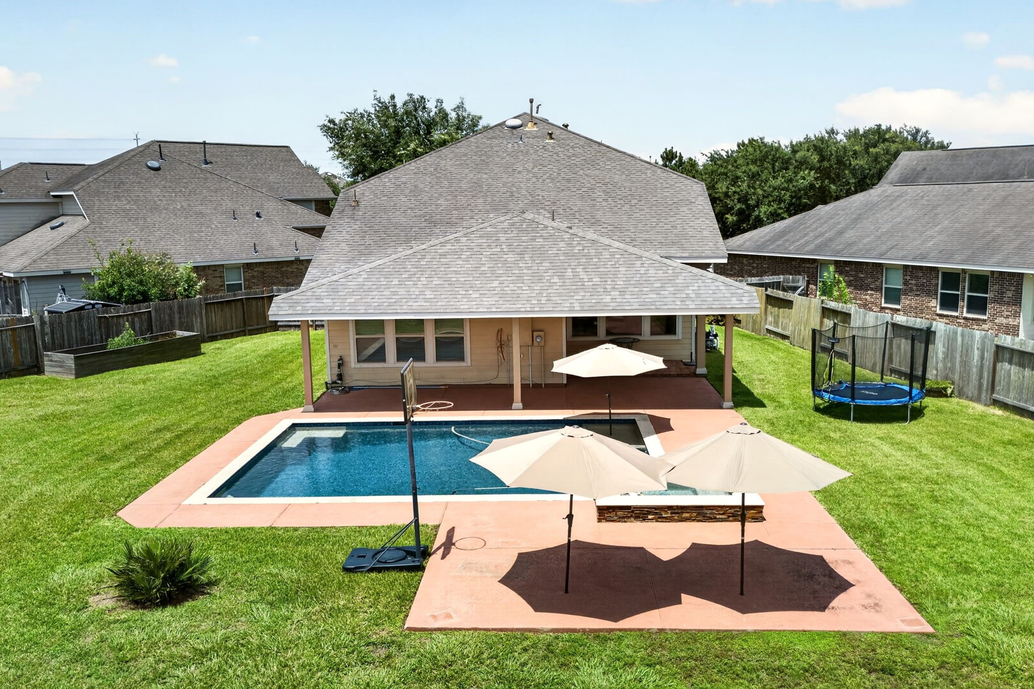 6446 Tea Tree Drive Katy, TX 77494 - Photo 30 of 39 Back Yard -
This back yard retreat will be the fun spot this summer.