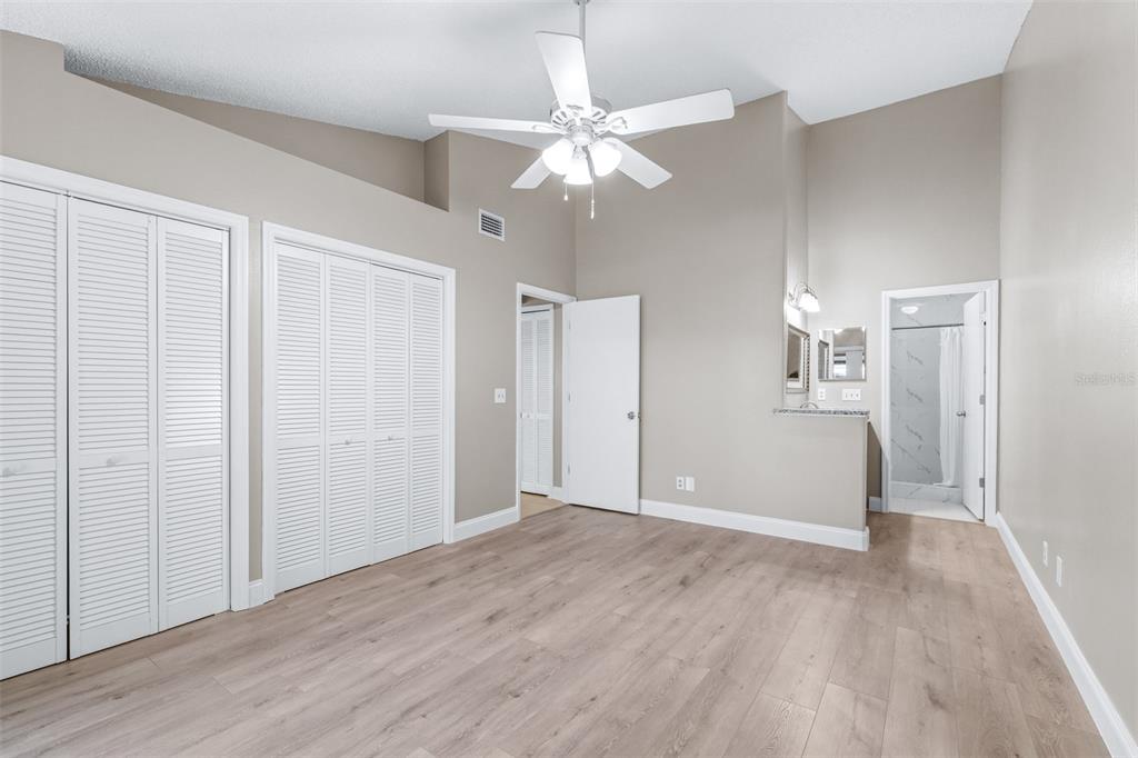 5100 Burchette Road, Unit 2505 Tampa, FL 33647 - Photo 21 of 47 a view of an empty room with wooden floor