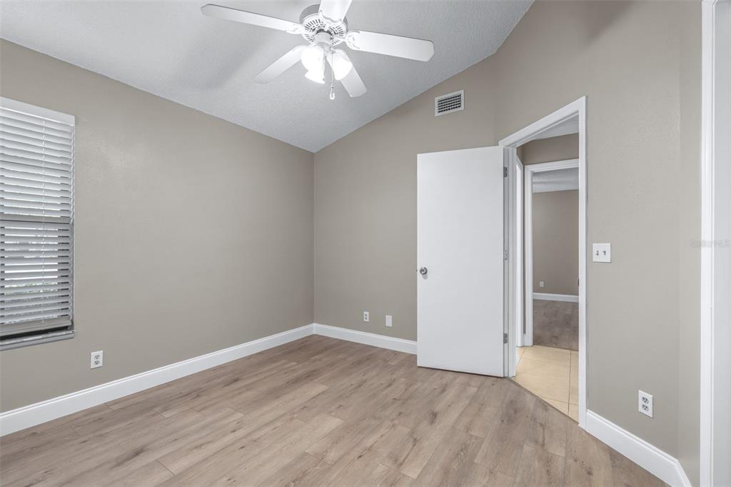 5100 Burchette Road, Unit 2505 Tampa, FL 33647 - Photo 29 of 47 wooden floor in an empty room with a window