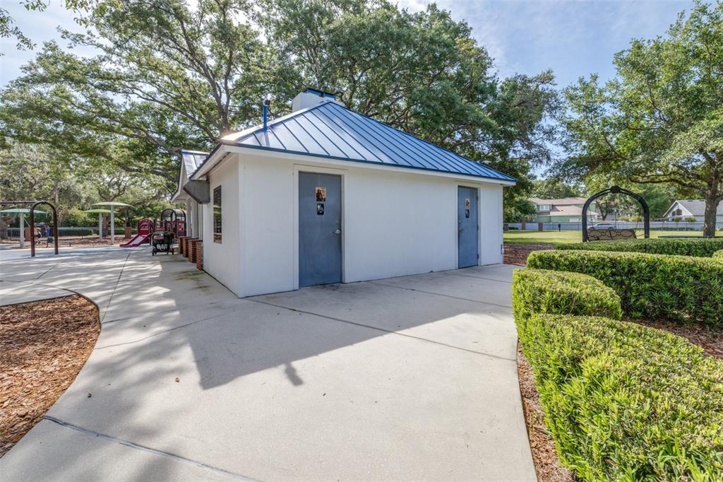 5100 Burchette Road, Unit 2505 Tampa, FL 33647 - Photo 45 of 47 a view of a house with a yard plants and large tree
