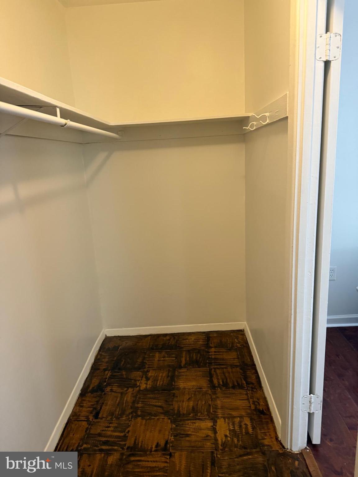 1604 Renate Drive, Unit 104 Woodbridge, VA 22192 - Photo 23 of 29 a view of a room with wooden floor and cabinet