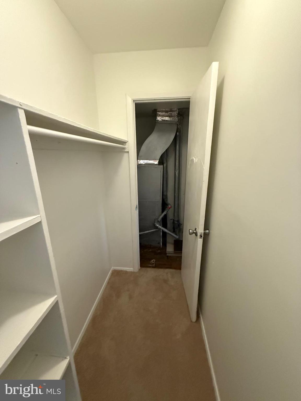 1604 Renate Drive, Unit 104 Woodbridge, VA 22192 - Photo 25 of 29 a room with a washer and dryer