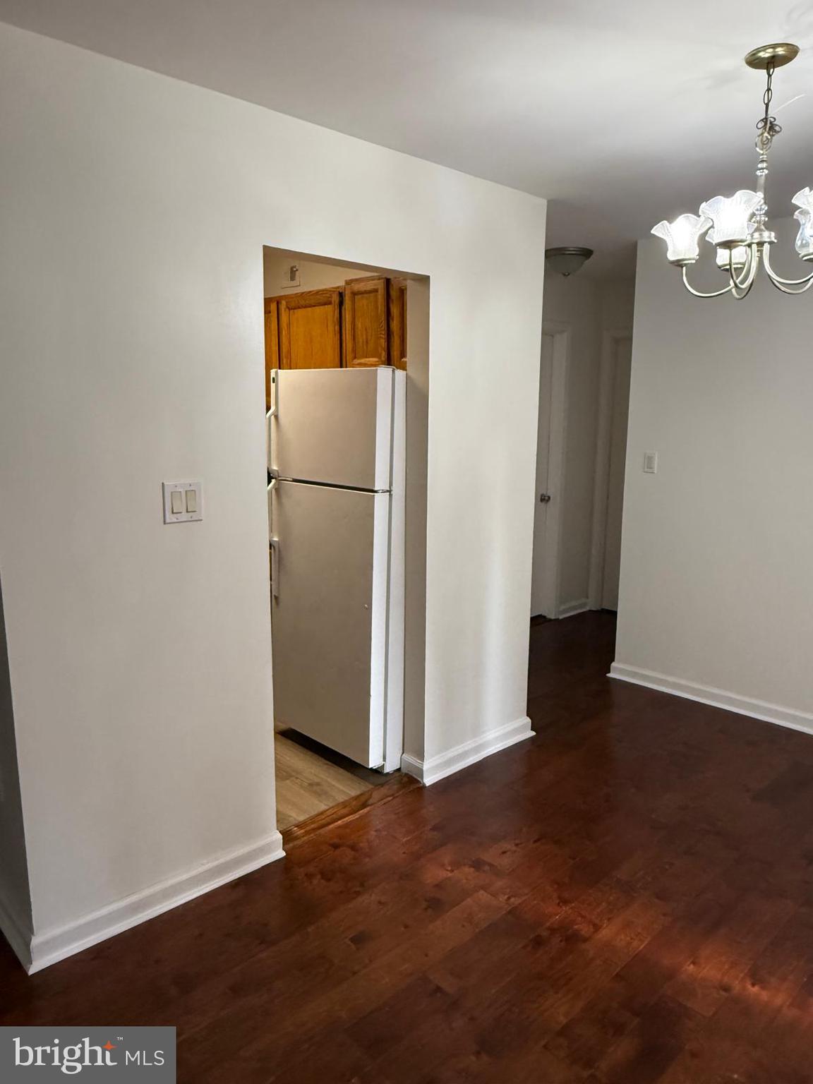 1604 Renate Drive, Unit 104 Woodbridge, VA 22192 - Photo 10 of 29 a view of a room with wooden floor