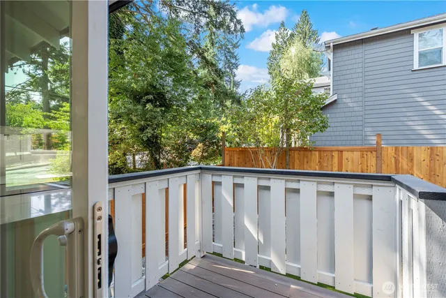 a view of wooden house with a street
