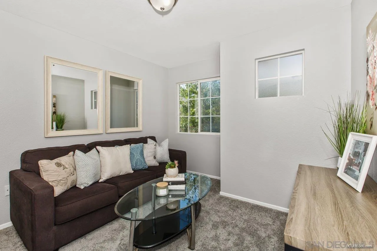 1867 McDougal Terrace El Cajon, CA 92021 - Photo 12 of 28 a living room with furniture and wooden floor