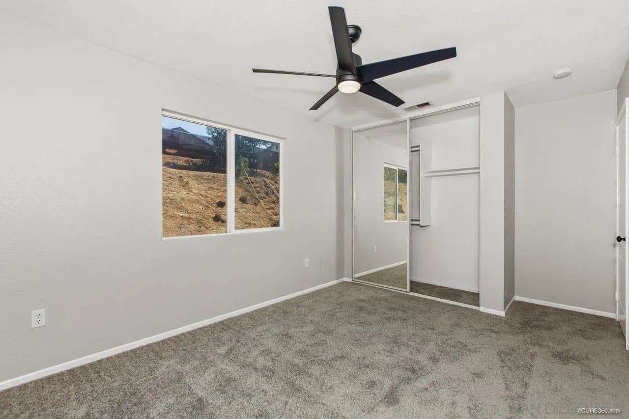 1867 McDougal Terrace El Cajon, CA 92021 - Photo 13 of 28 a view of an empty room with a window