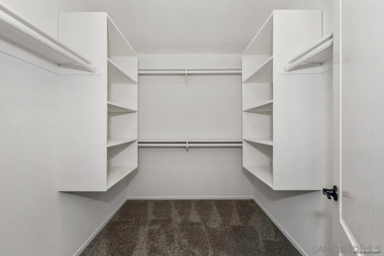 1867 McDougal Terrace El Cajon, CA 92021 - Photo 22 of 28 a view of an empty walk in closet