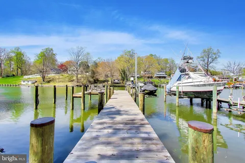 a wooden bridge near lake