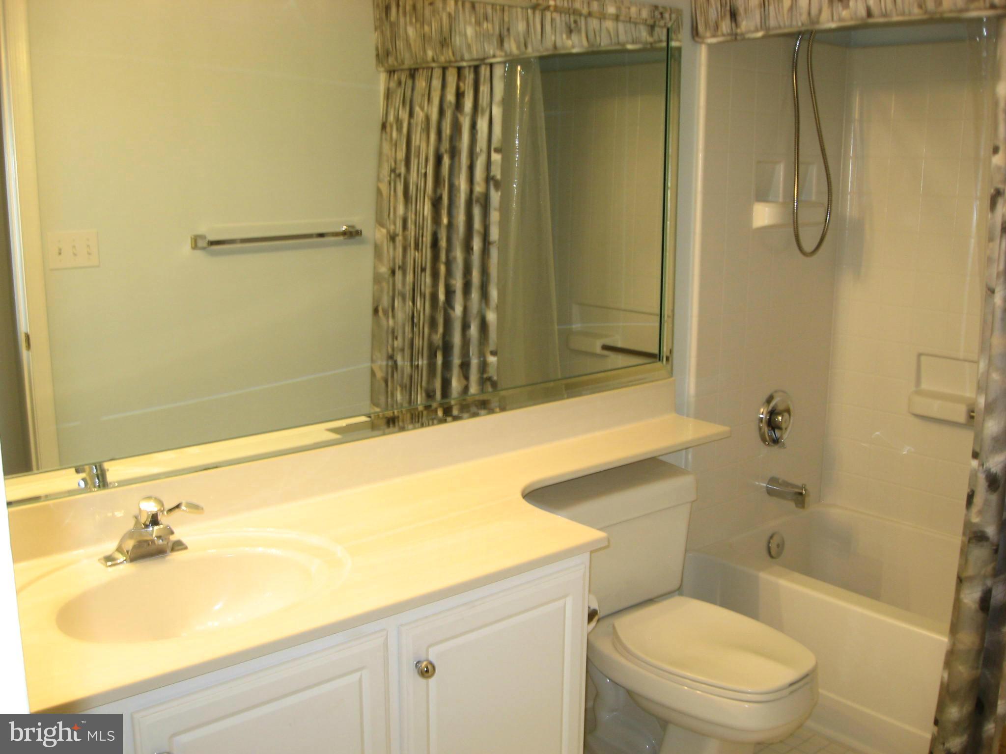 14800 Pennfield Circle, Unit 301 Silver Spring, MD 20906 - Photo 20 of 30 Hall Bedroom
