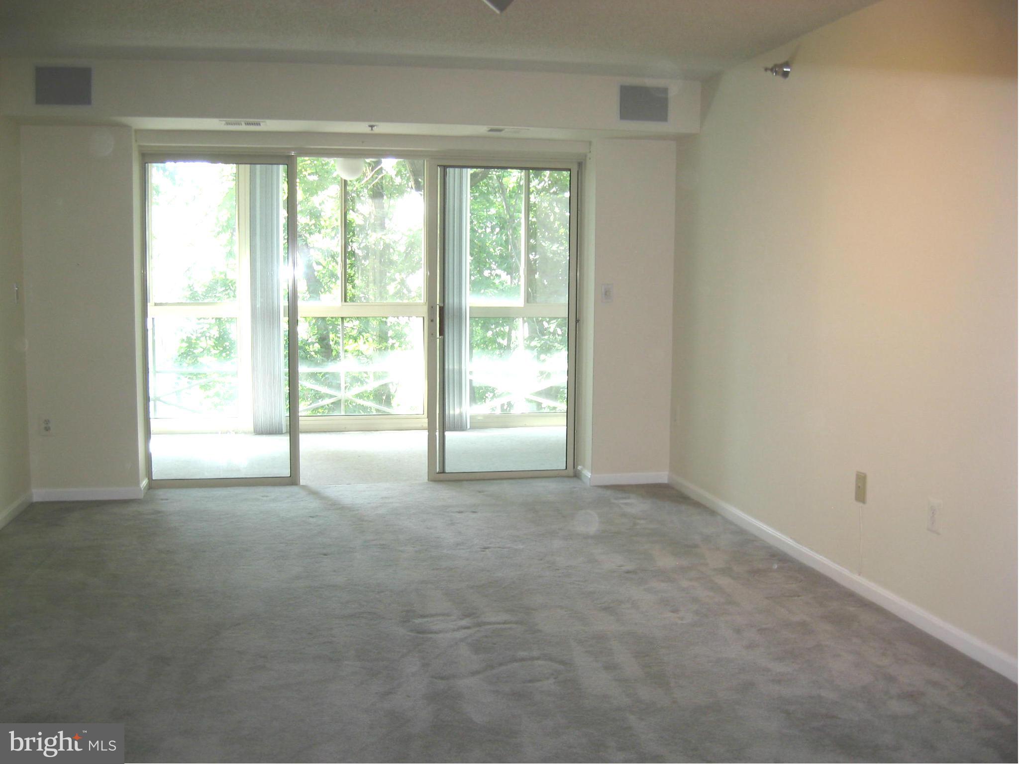 14800 Pennfield Circle, Unit 301 Silver Spring, MD 20906 - Photo 7 of 30 Living Room