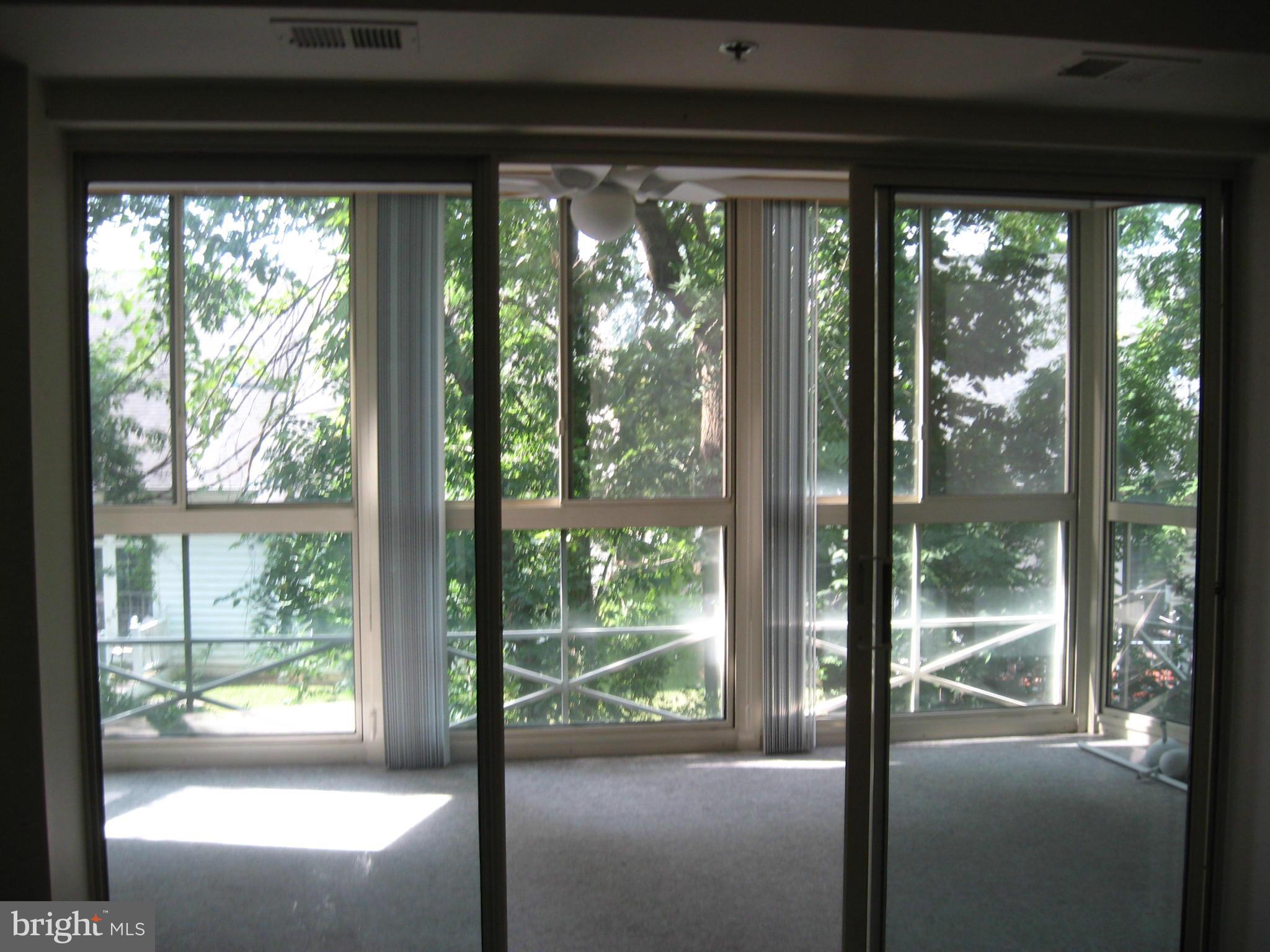 14800 Pennfield Circle, Unit 301 Silver Spring, MD 20906 - Photo 8 of 30 Enclosed Balcony