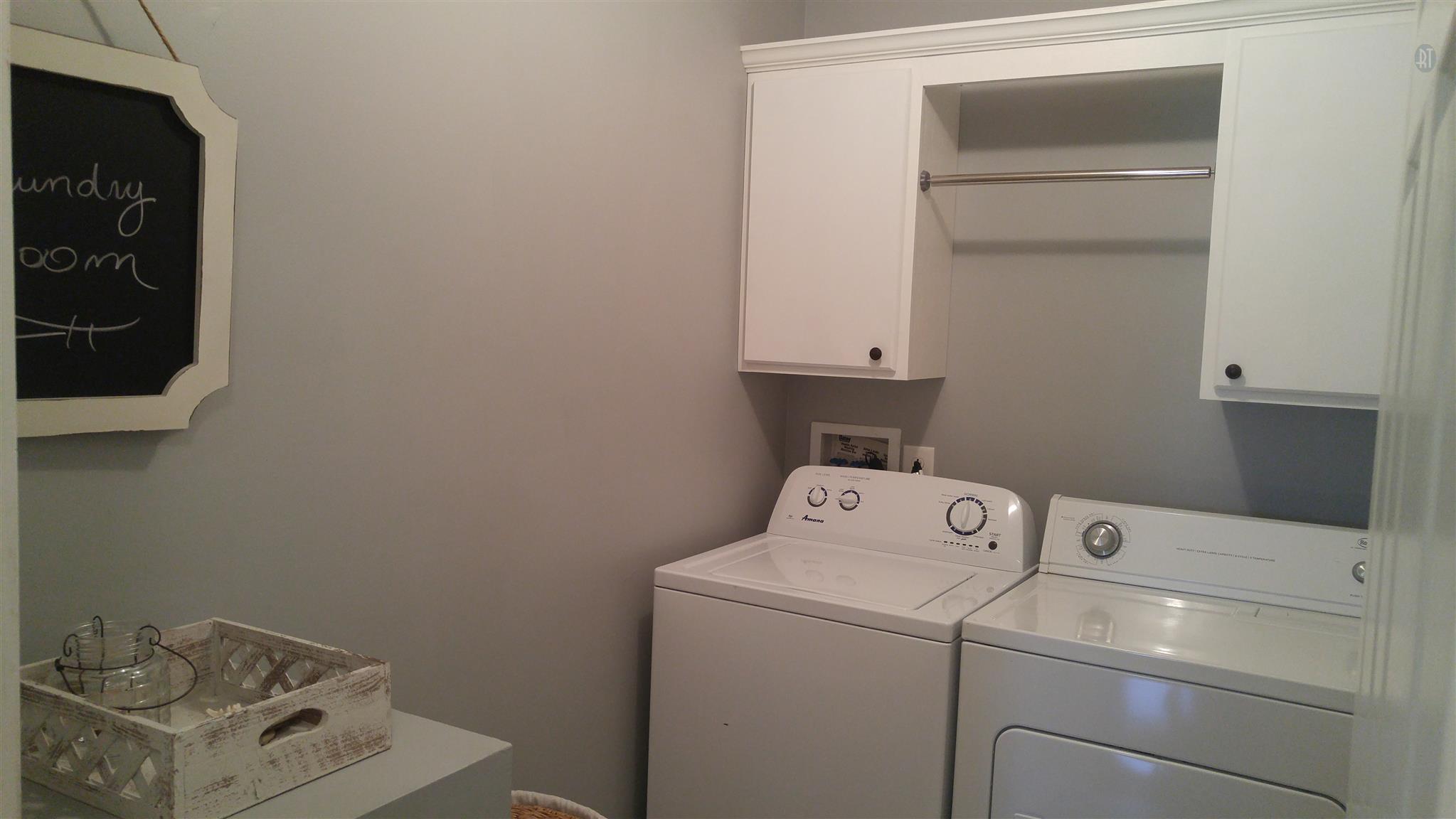 282 Collins Road Portland, TN 37148 - Photo 11 of 28 a utility room with dryer and washer
