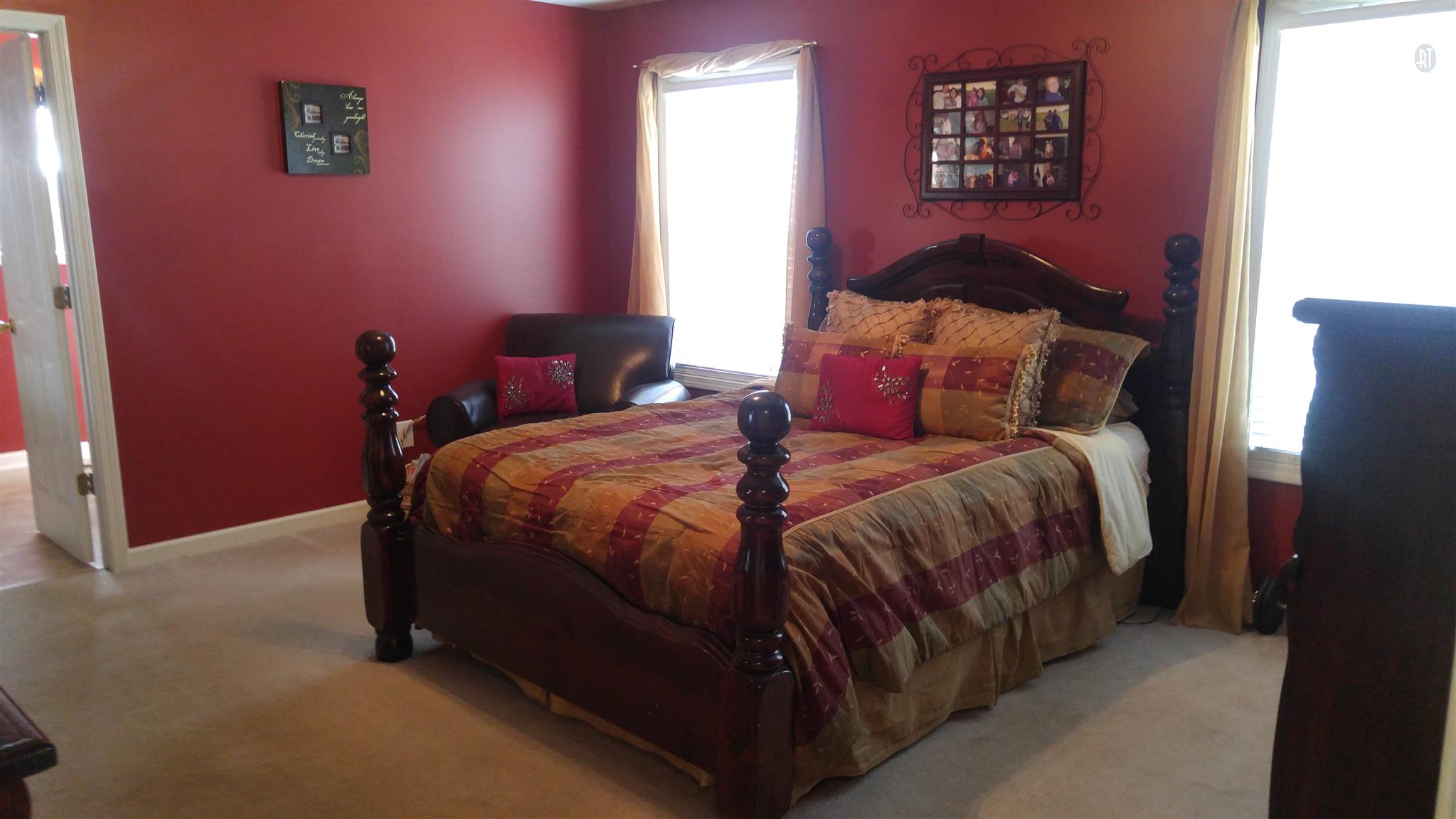282 Collins Road Portland, TN 37148 - Photo 14 of 28 a bed sitting in a bedroom next to a window