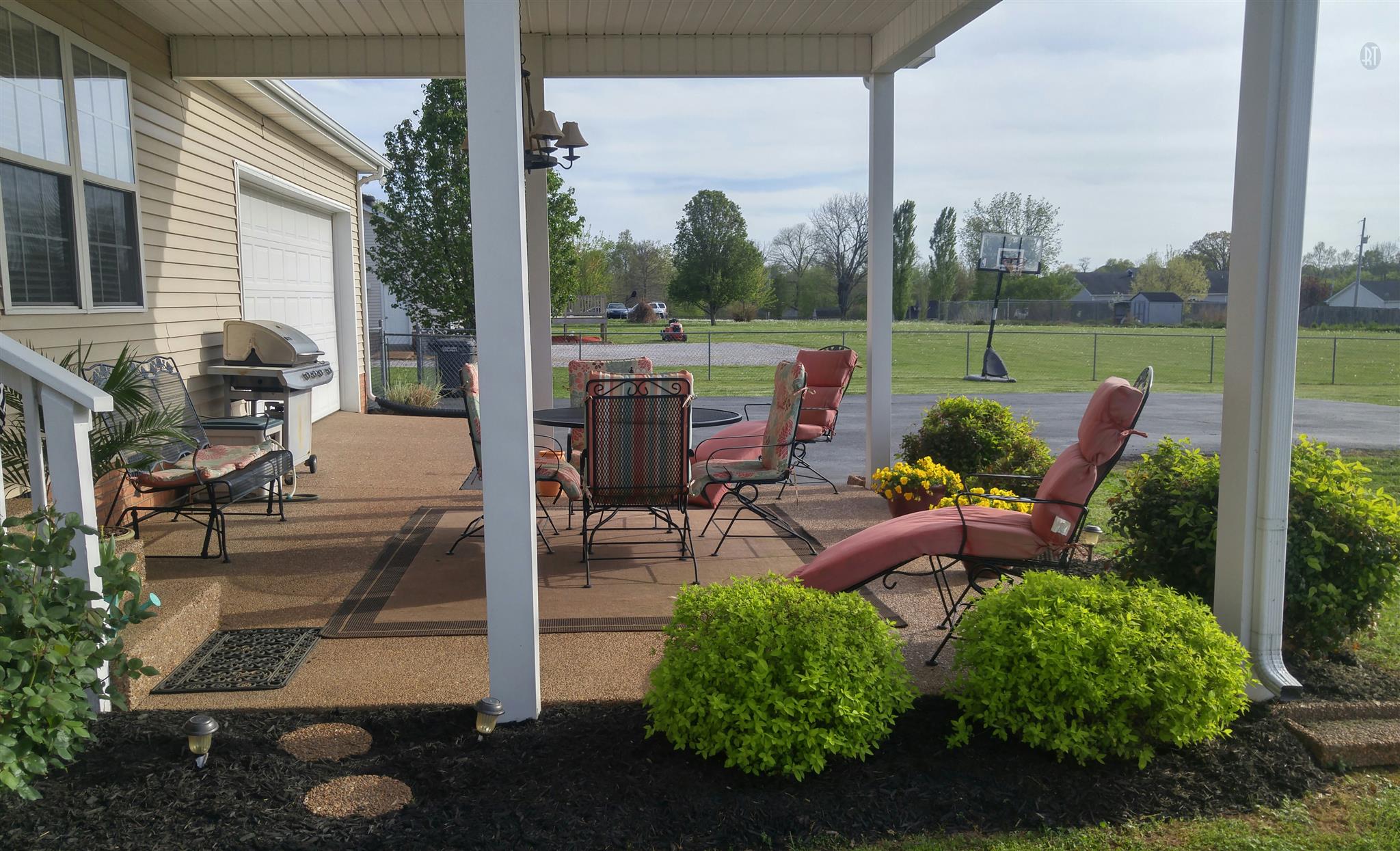 282 Collins Road Portland, TN 37148 - Photo 25 of 28 a view of a patio with chairs and a table