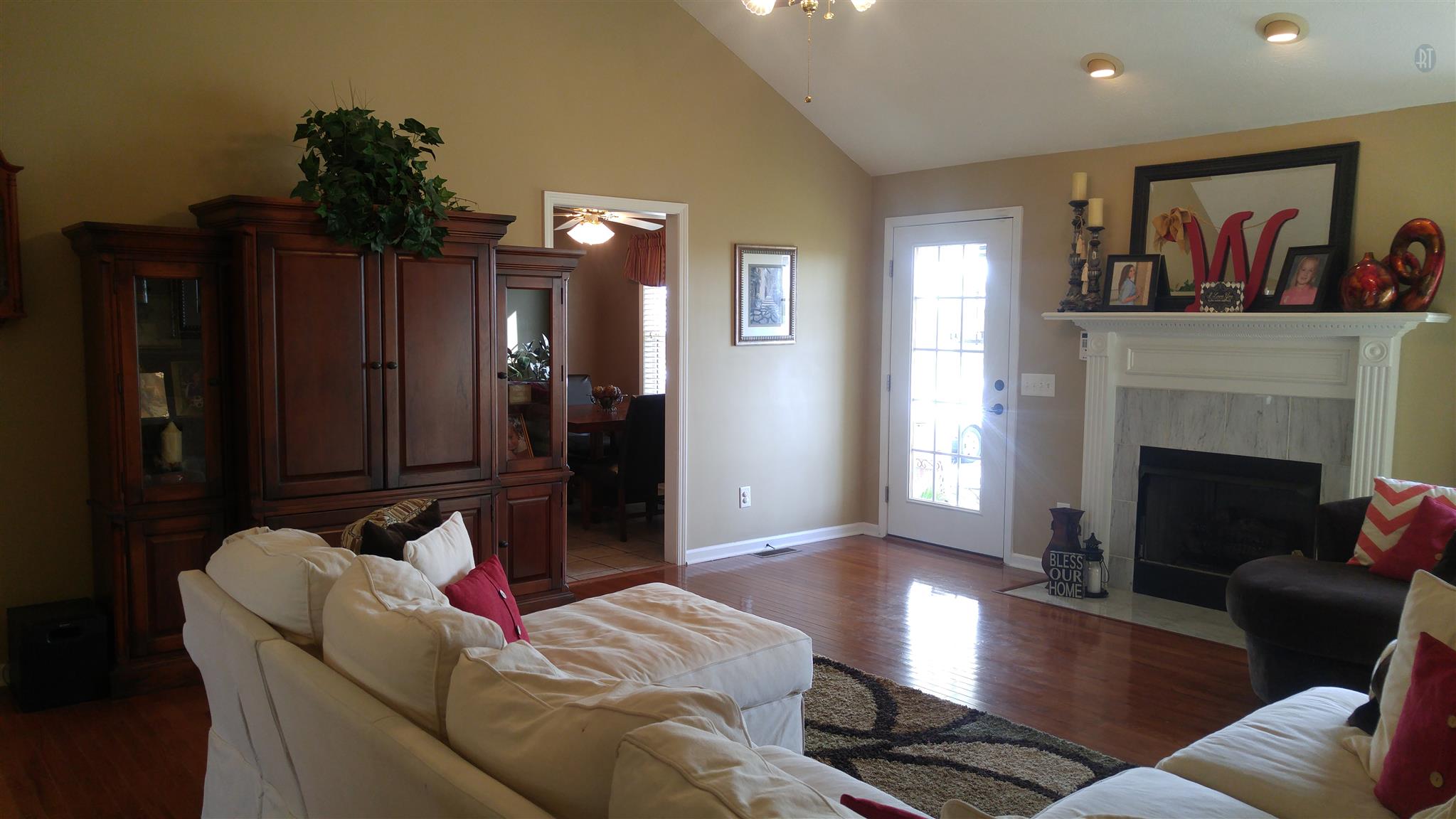 282 Collins Road Portland, TN 37148 - Photo 4 of 28 a living room with furniture and a fireplace