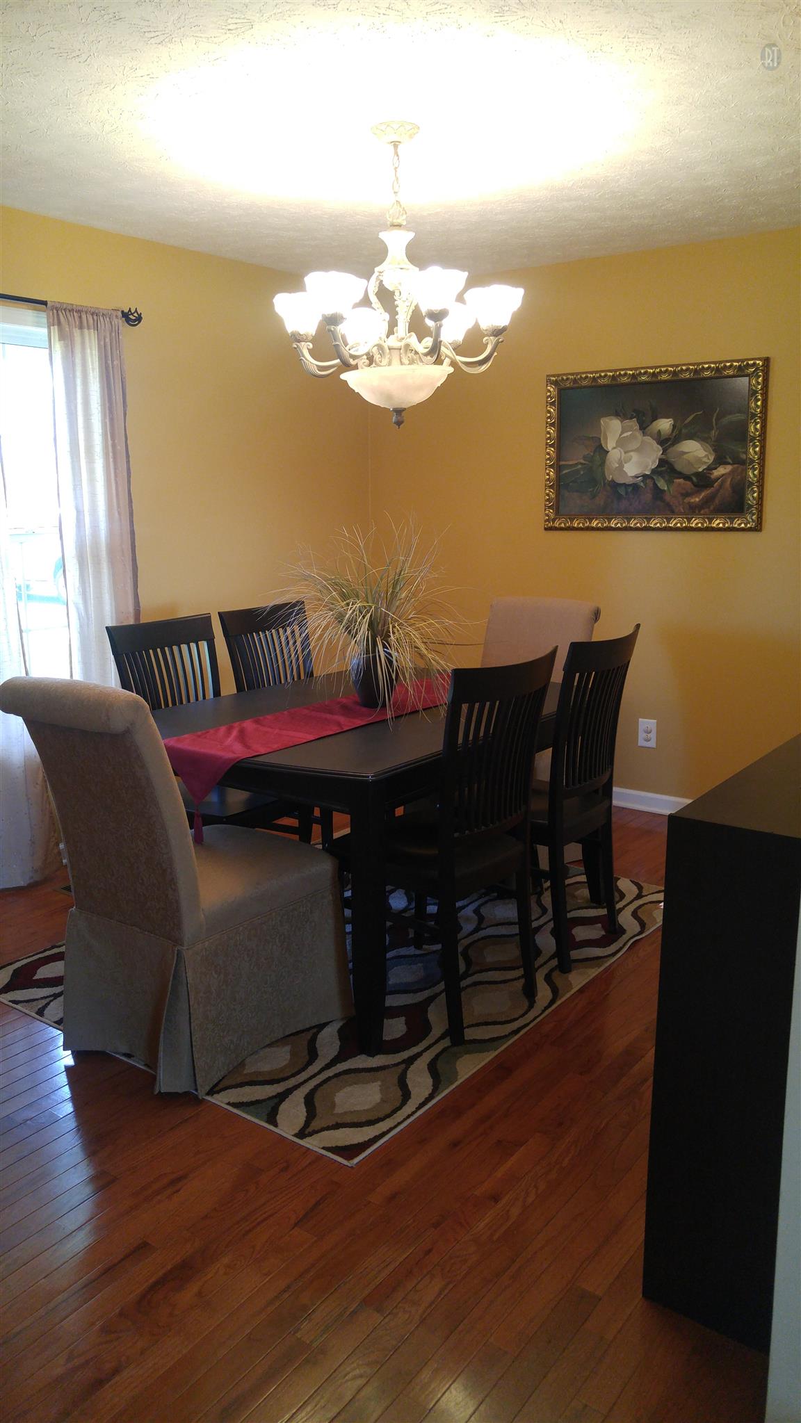 282 Collins Road Portland, TN 37148 - Photo 6 of 28 a view of a dining room with furniture and chandelier
