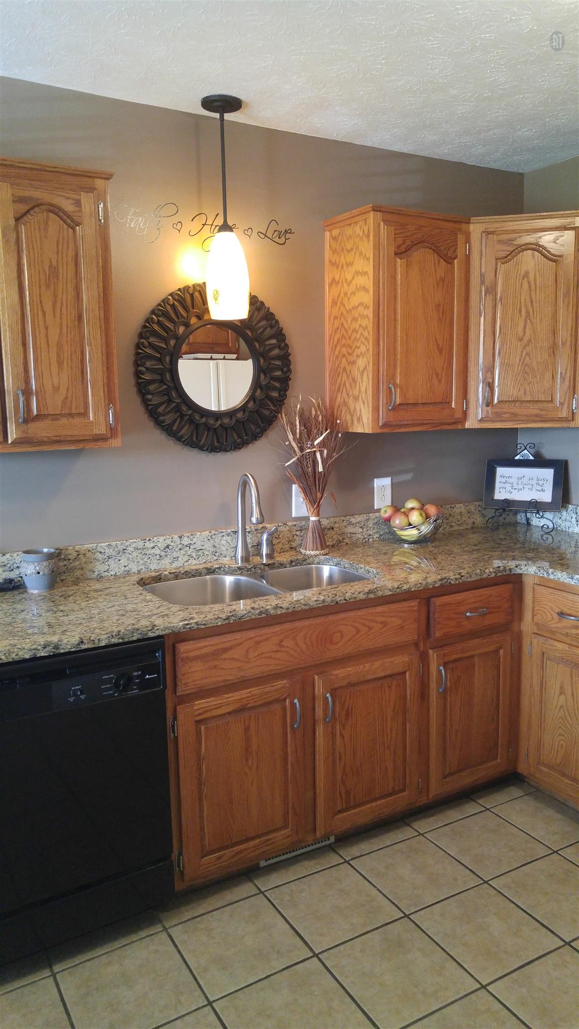 282 Collins Road Portland, TN 37148 - Photo 8 of 28 a kitchen with granite countertop a sink and a stove