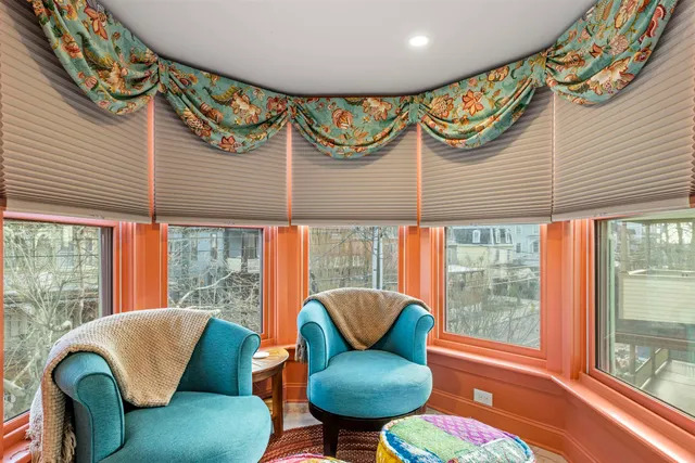 a view of a chairs in a balcony