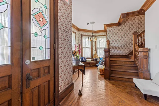 a view of living room kitchen and windows