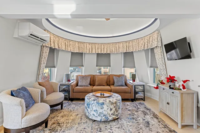 a living room with furniture and a couch