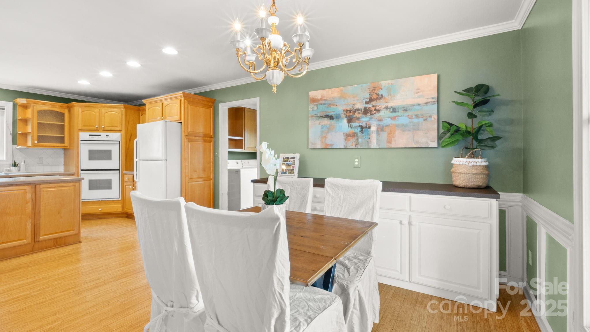 8809 Fairview Road Mint Hill, NC 28227 - Photo 15 of 43 a dining room with furniture and window