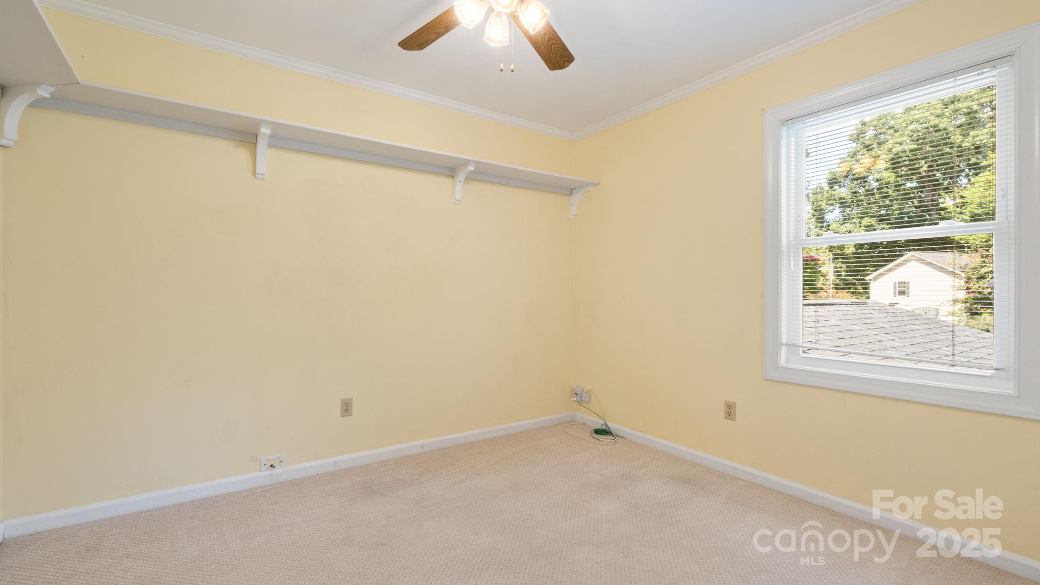 8809 Fairview Road Mint Hill, NC 28227 - Photo 28 of 43 an empty room with a window