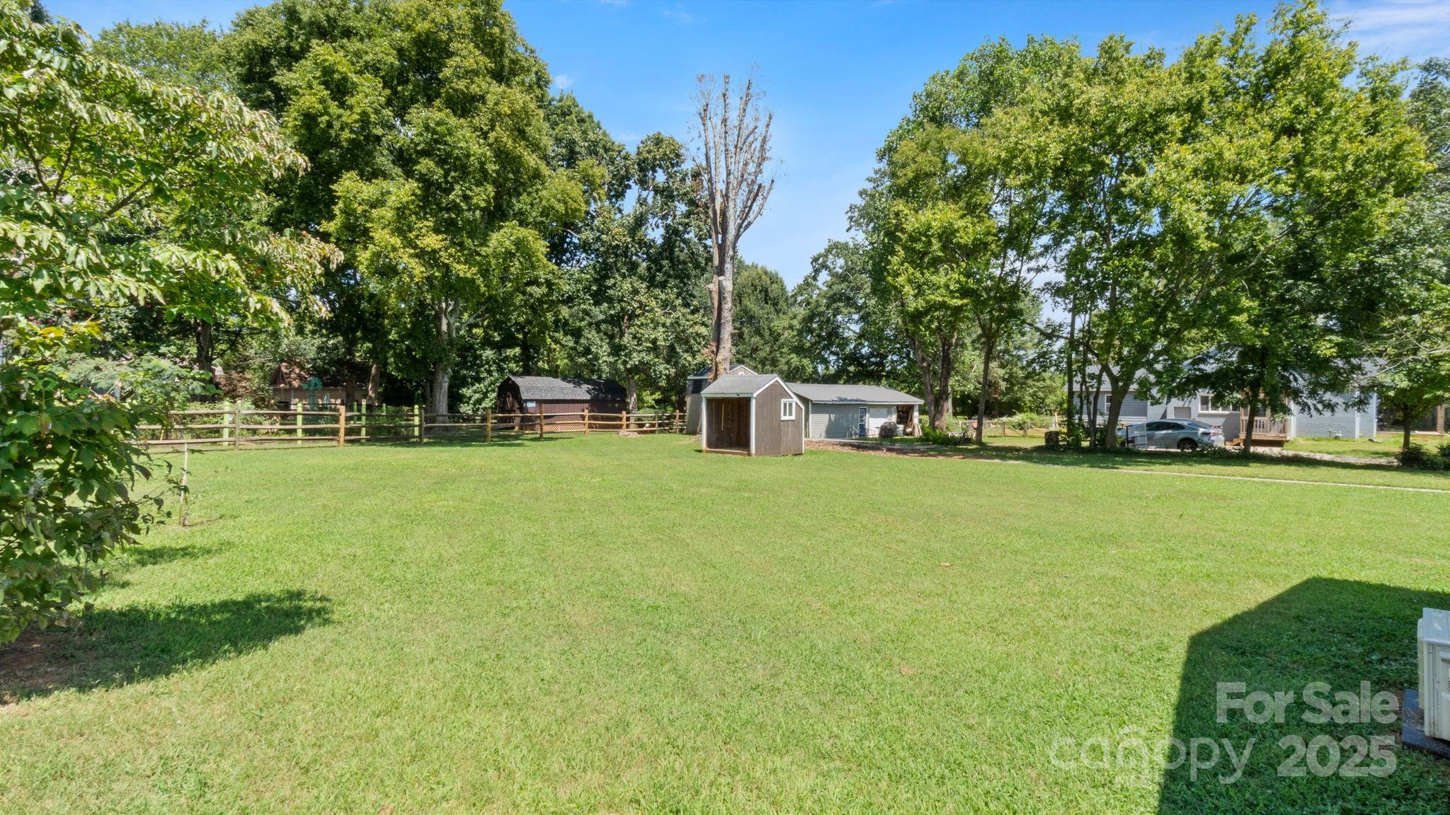 8809 Fairview Road Mint Hill, NC 28227 - Photo 36 of 43 a view of a park with large trees
