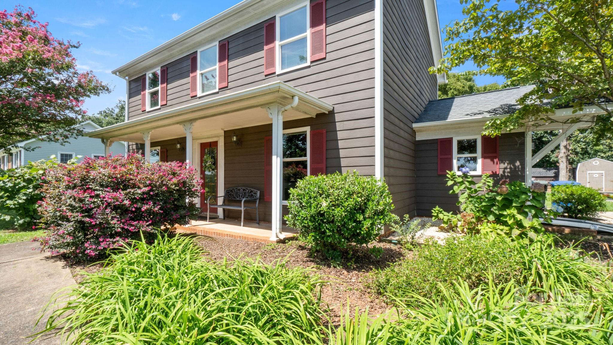 8809 Fairview Road Mint Hill, NC 28227 - Photo 7 of 43 front view of a house with a yard