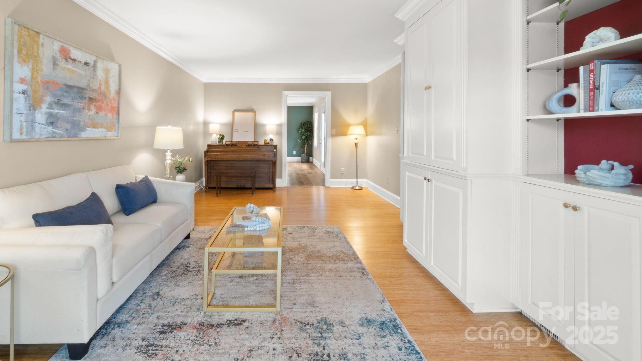 8809 Fairview Road Mint Hill, NC 28227 - Photo 9 of 43 a living room with furniture and a rug