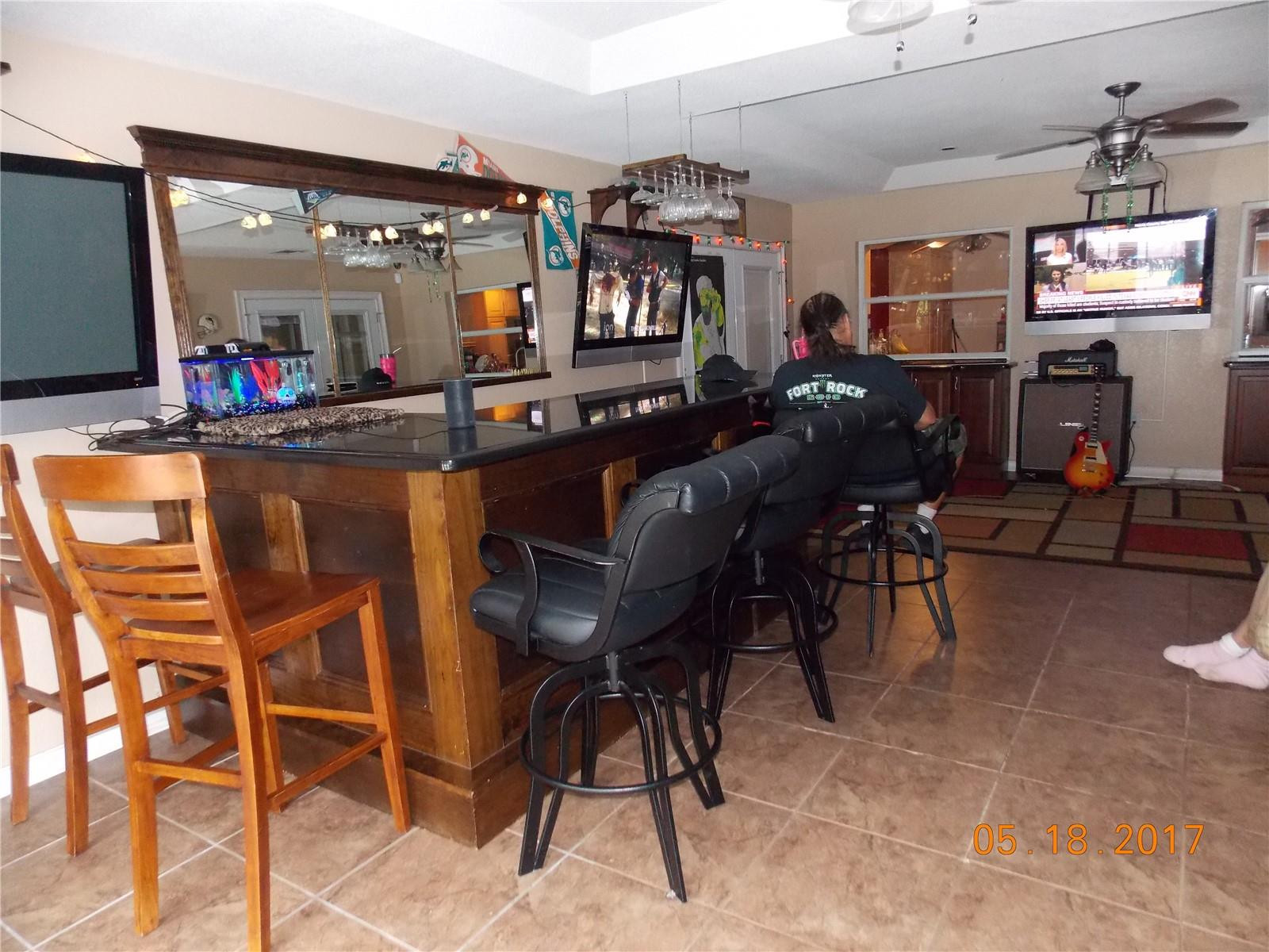 18521 Southwest 55th Street Southwest Ranches, FL 33332 - Photo 15 of 17 a view of a dining room with furniture