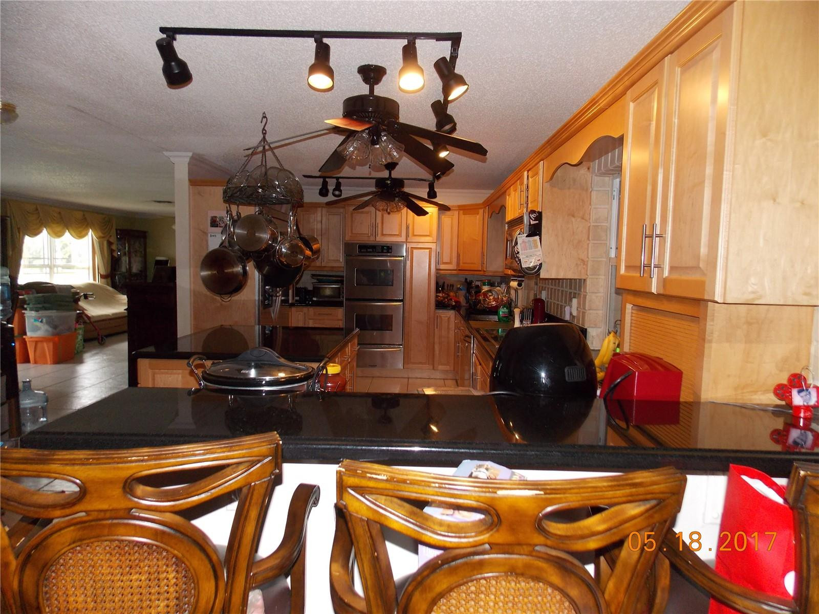18521 Southwest 55th Street Southwest Ranches, FL 33332 - Photo 5 of 17 a room with musical instruments