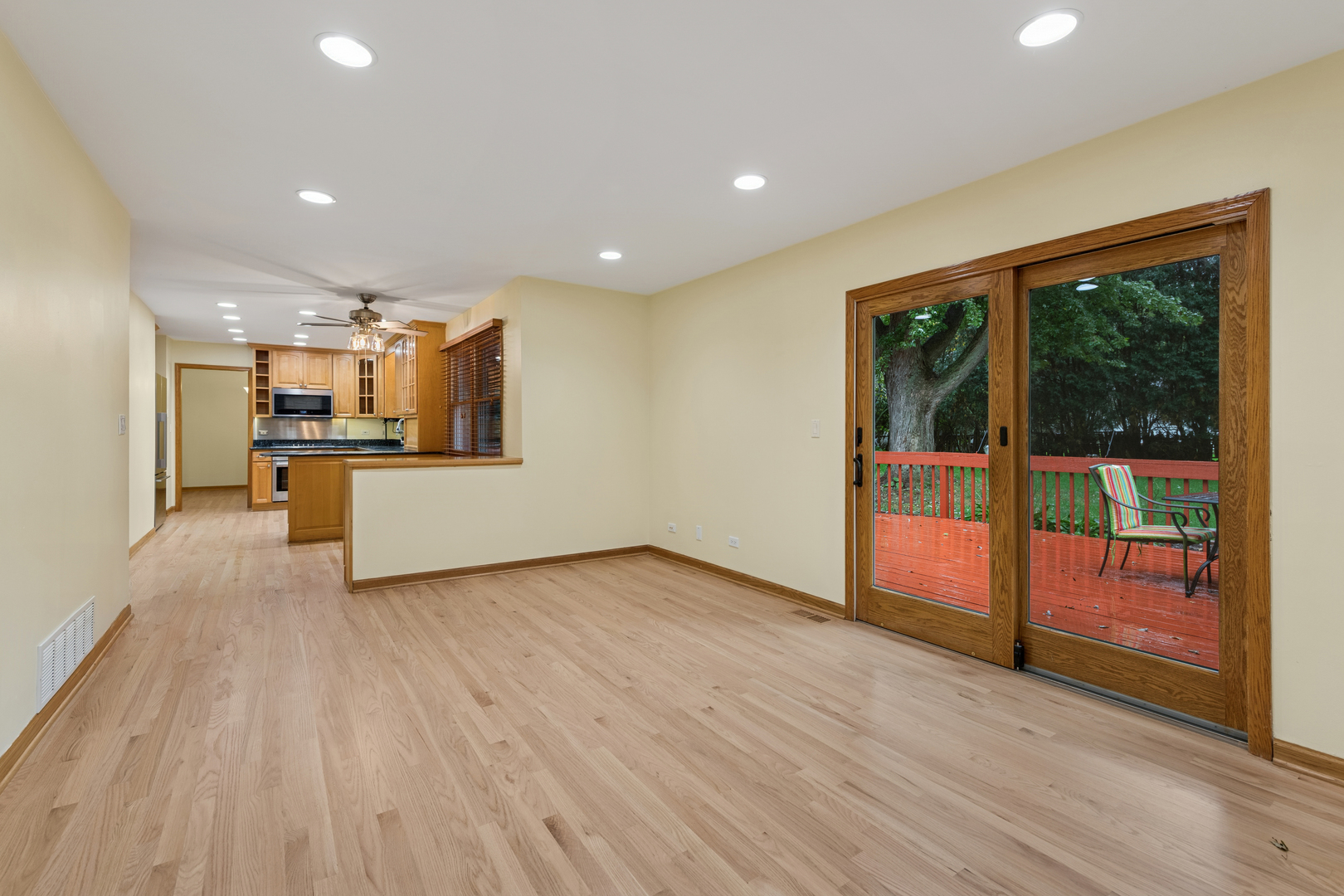 226 Aberdeen Road Cary, IL 60013 - Photo 16 of 40 a view of a big room with wooden floor and windows