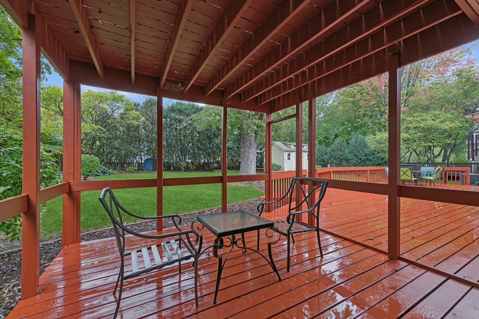226 Aberdeen Road Cary, IL 60013 - Photo 32 of 40 a view of a patio with chairs and wooden floor