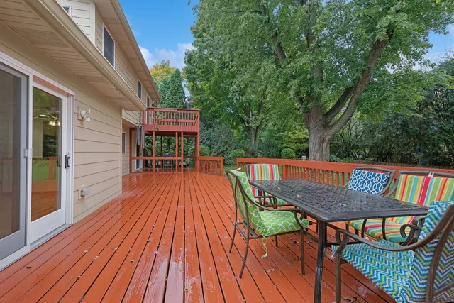 a balcony view with a seating space