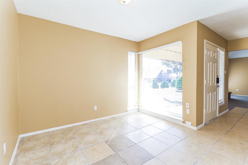 857 Via Altos Mesquite, TX 75150 - Photo 4 of 16 a view of an empty room with a window