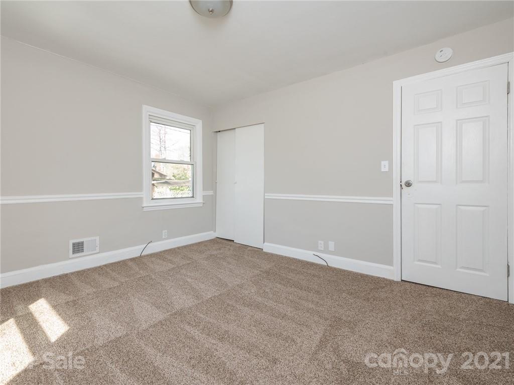 502 Davis Park Road Gastonia, NC 28052 - Photo 12 of 20 an empty room with windows