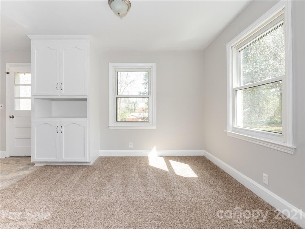 502 Davis Park Road Gastonia, NC 28052 - Photo 5 of 20 an empty room with windows