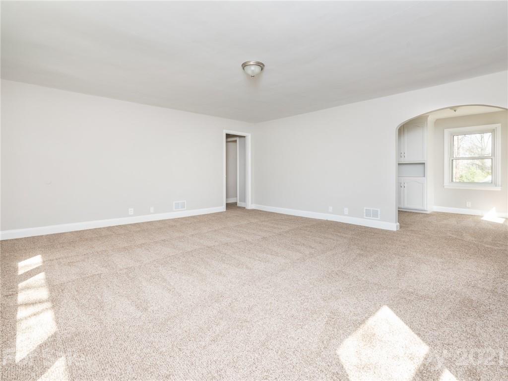 502 Davis Park Road Gastonia, NC 28052 - Photo 9 of 20 a view of an empty room and window