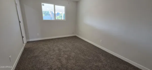 an empty room with windows