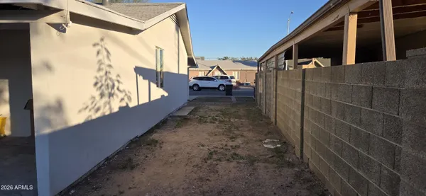 a view of a house with a street