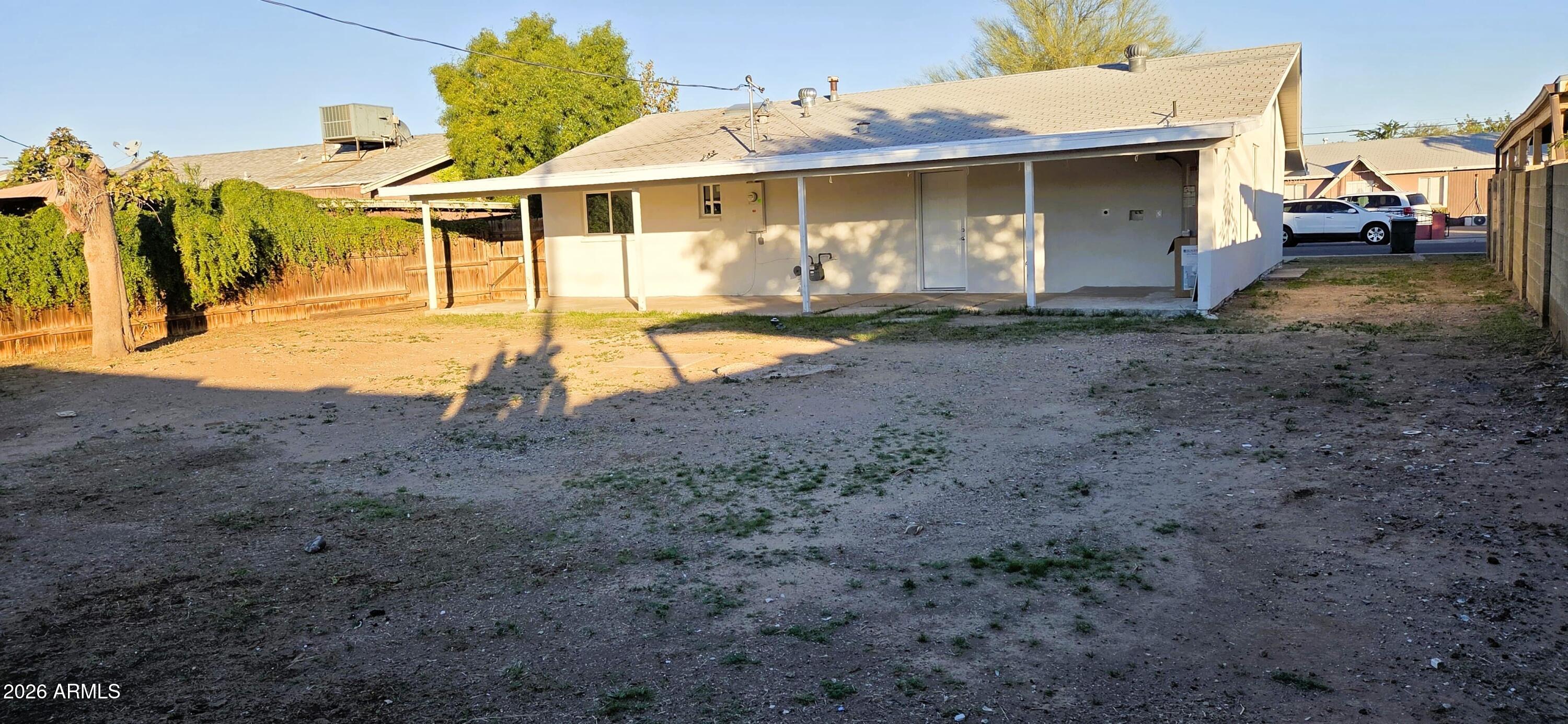 5721 West Cheery Lynn Road Phoenix, AZ 85031 - Photo 18 of 20 a view of a house with backyard