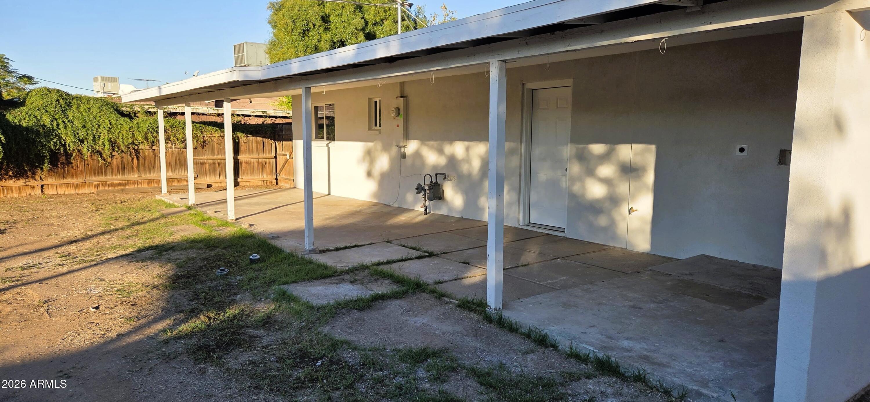 5721 West Cheery Lynn Road Phoenix, AZ 85031 - Photo 19 of 20 a view of a house with backyard