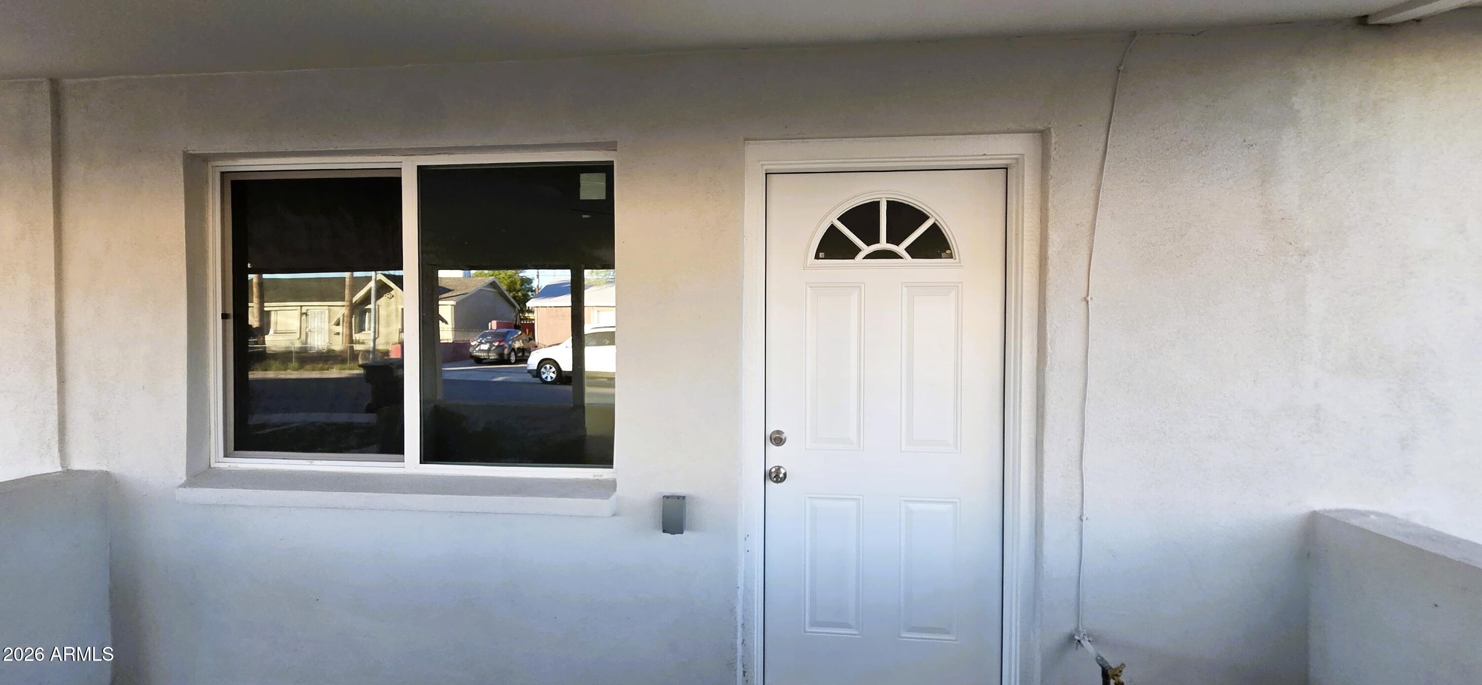 5721 West Cheery Lynn Road Phoenix, AZ 85031 - Photo 4 of 20 a view of a front door of the house