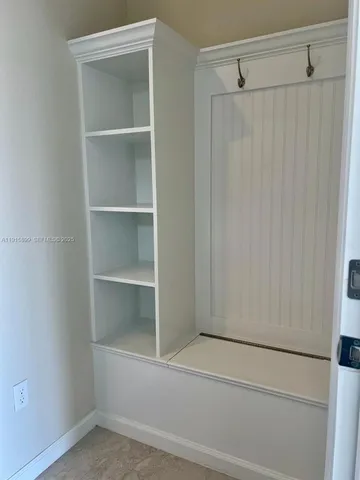 a view of an empty walk in closet