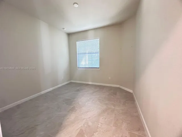 an empty room with a window