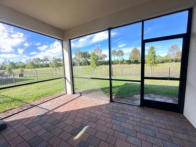 a view of a porch with a back yard