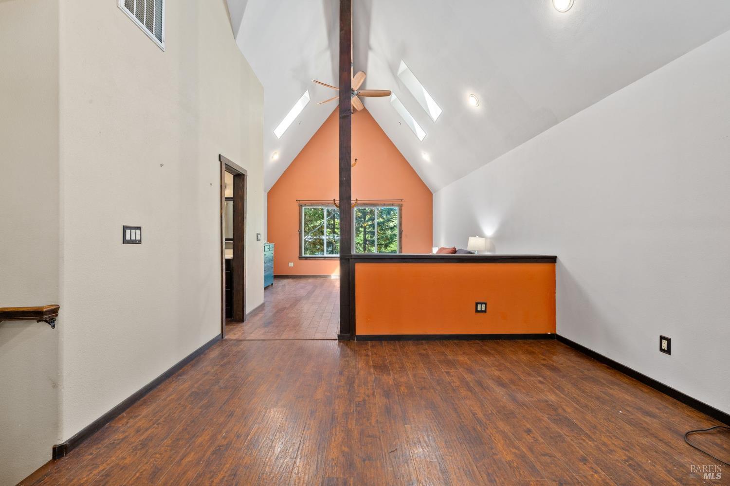 9935 Occidental Road Sebastopol, CA 95472 - Photo 22 of 59 Upstairs primary/sitting area, divided by a pony wall