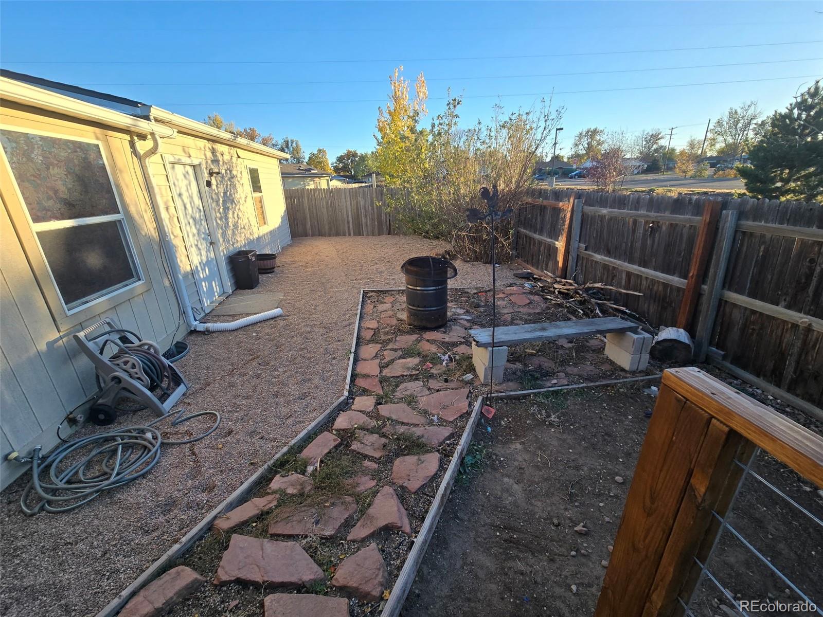 3439 West 3rd Street Road Greeley, CO 80631 - Photo 27 of 31 a view of a backyard with sitting area